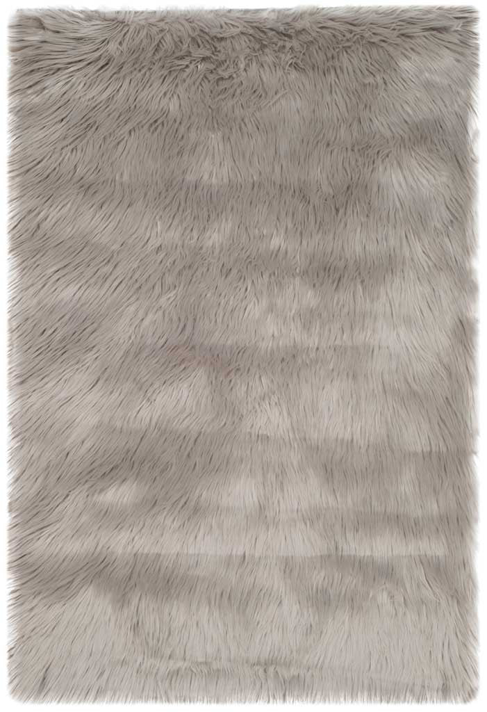 Soft gray accent rug with a lush, even shag and a compact rectangular profile