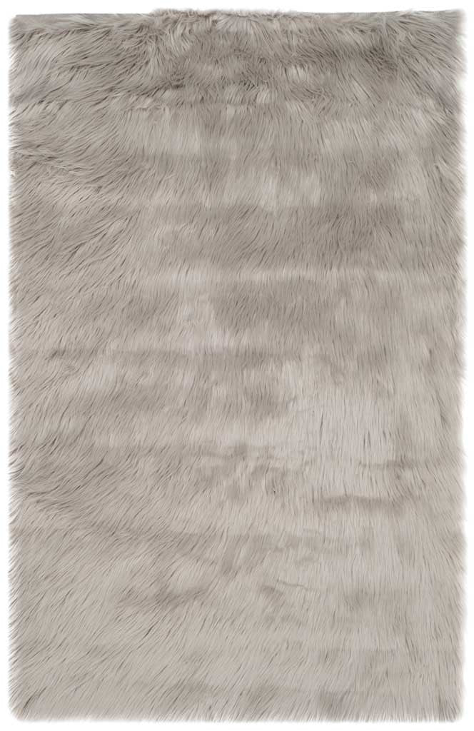 Pale gray rectangular rug with silky, long faux-fur fibers and softly defined edges