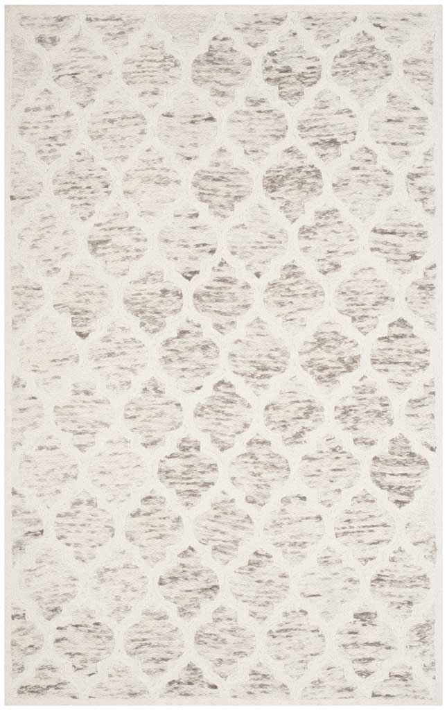 Gray and ivory wool area rug with a softly weathered quatrefoil pattern and slim border