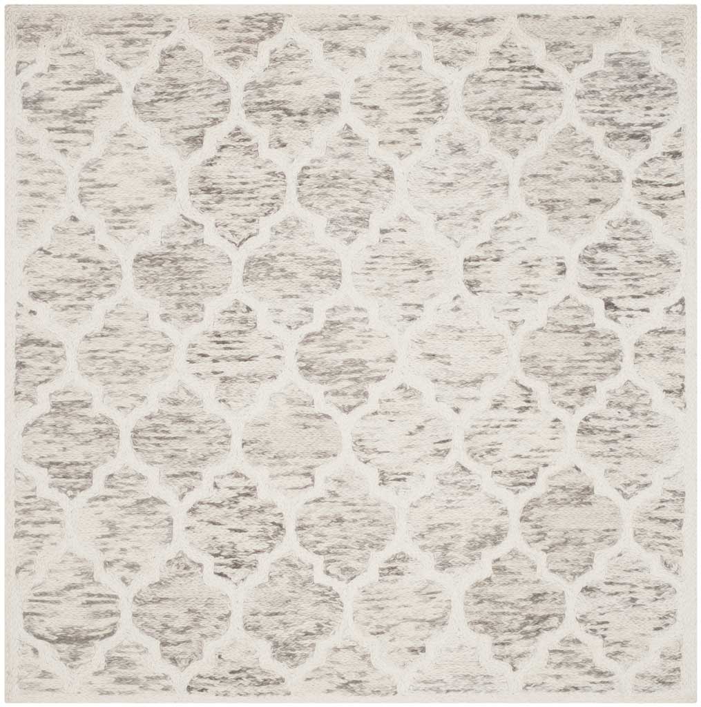 Square gray and ivory wool rug with oversized, textured quatrefoil motifs