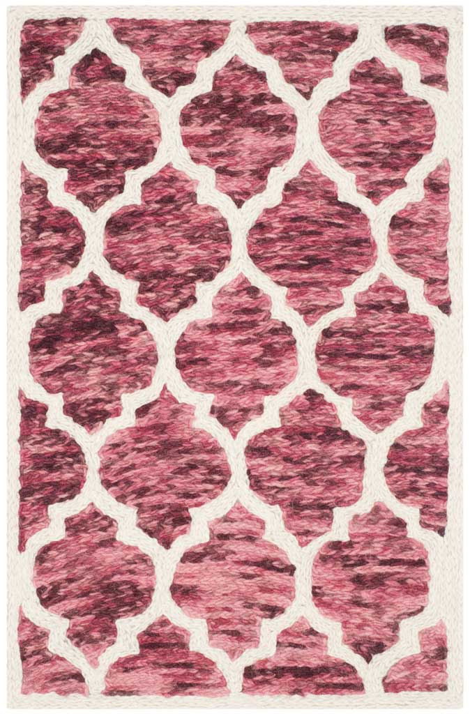 Oversized rose-red quatrefoils add bold color to this ivory-bordered wool accent rug
