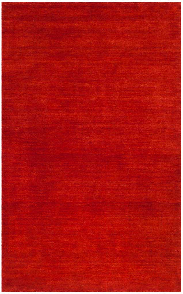 Vivid red rug brings striking color and subtle tonal depth to smaller spaces