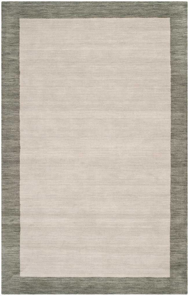 A light gray wool center framed in dark gray gives this rug subtle contrast