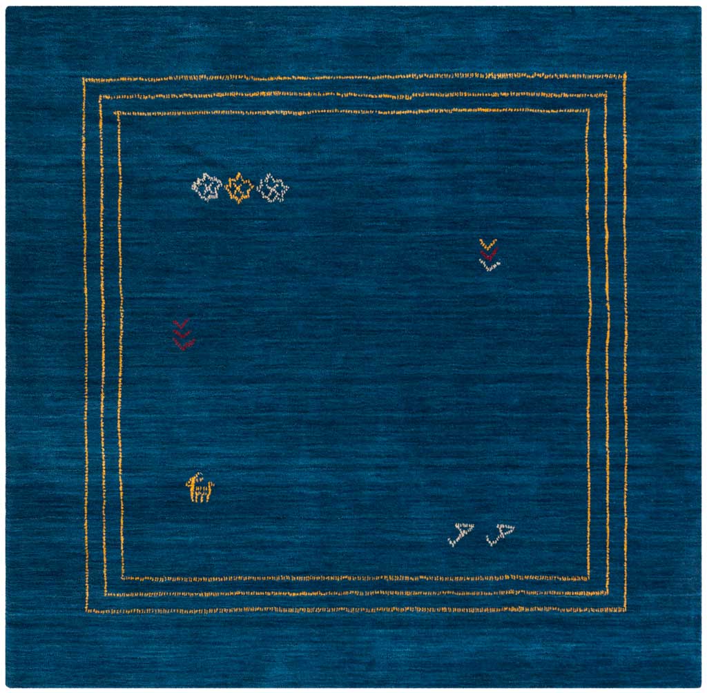 A square blue wool rug pairs fine gold framing with small, colorful motifs