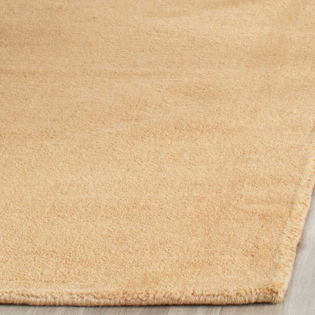 Soft beige pile and a neatly finished edge give this runner an inviting texture.