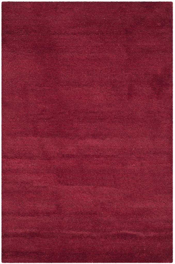 Compact crimson accent rug with softly mottled shading and tidy edges