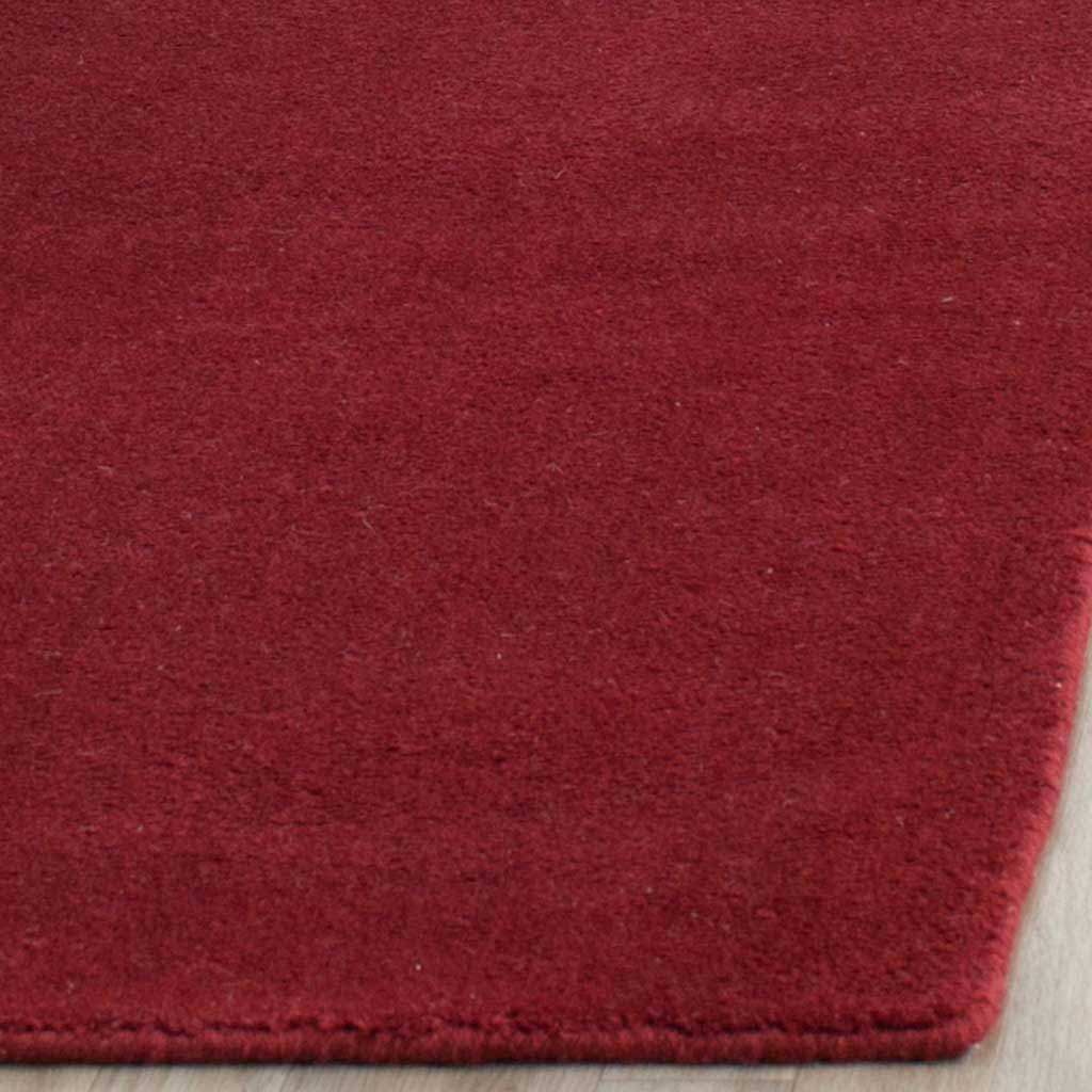 Deep red pile and a neat edge give this runner a soft, tailored finish.