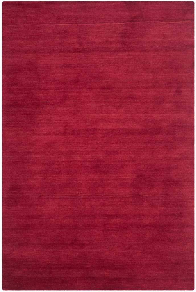 Rich red area rug with fine striations lending depth to its plush surface