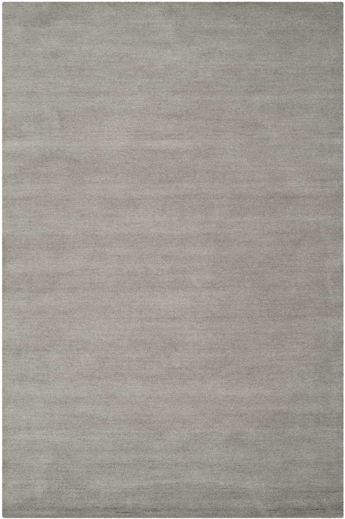 Gray rectangular rug combines a softly shaded pile with clean, simple edges