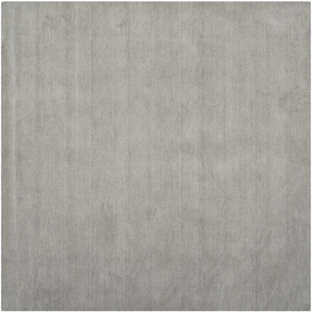 Square gray rug with finely varied color and a smooth, understated surface