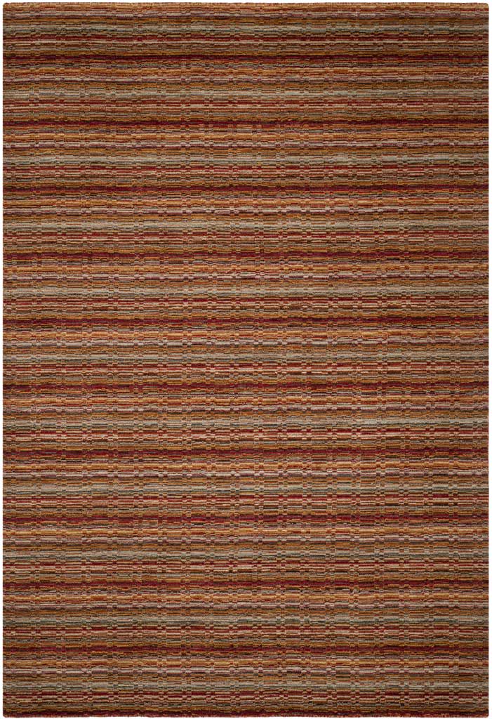 Fine stripes of rust, brown and cream create a richly textured wool rug