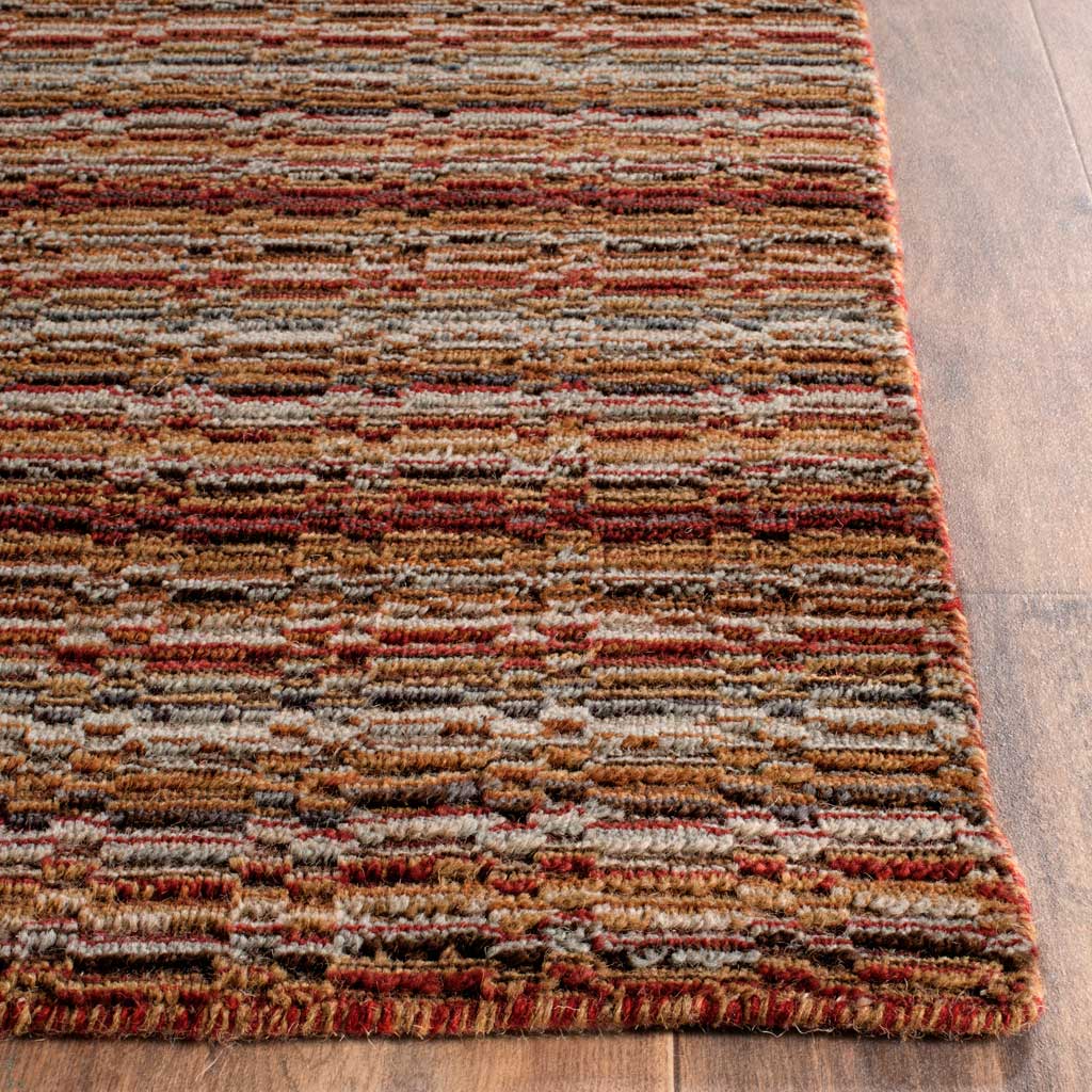 Textured wool stripes in layered earth tones meet at a neatly finished corner