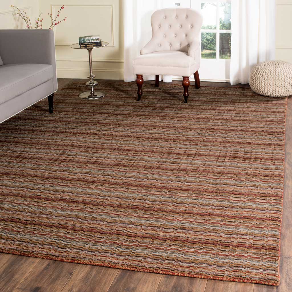 Multicolored wool stripes lend warmth and depth beneath living room seating
