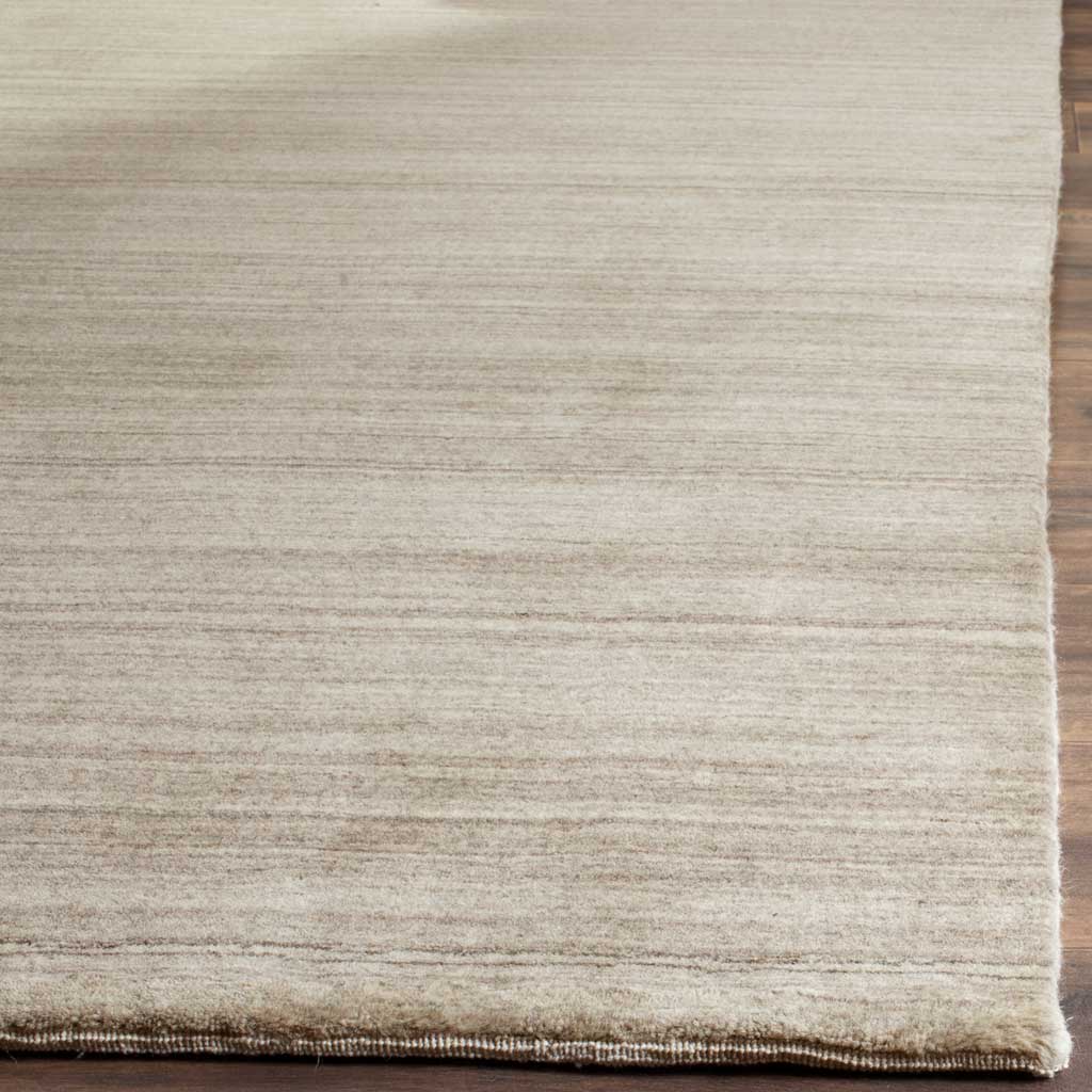 Fine stone-colored striations meet a neatly finished corner for a soft, tailored look