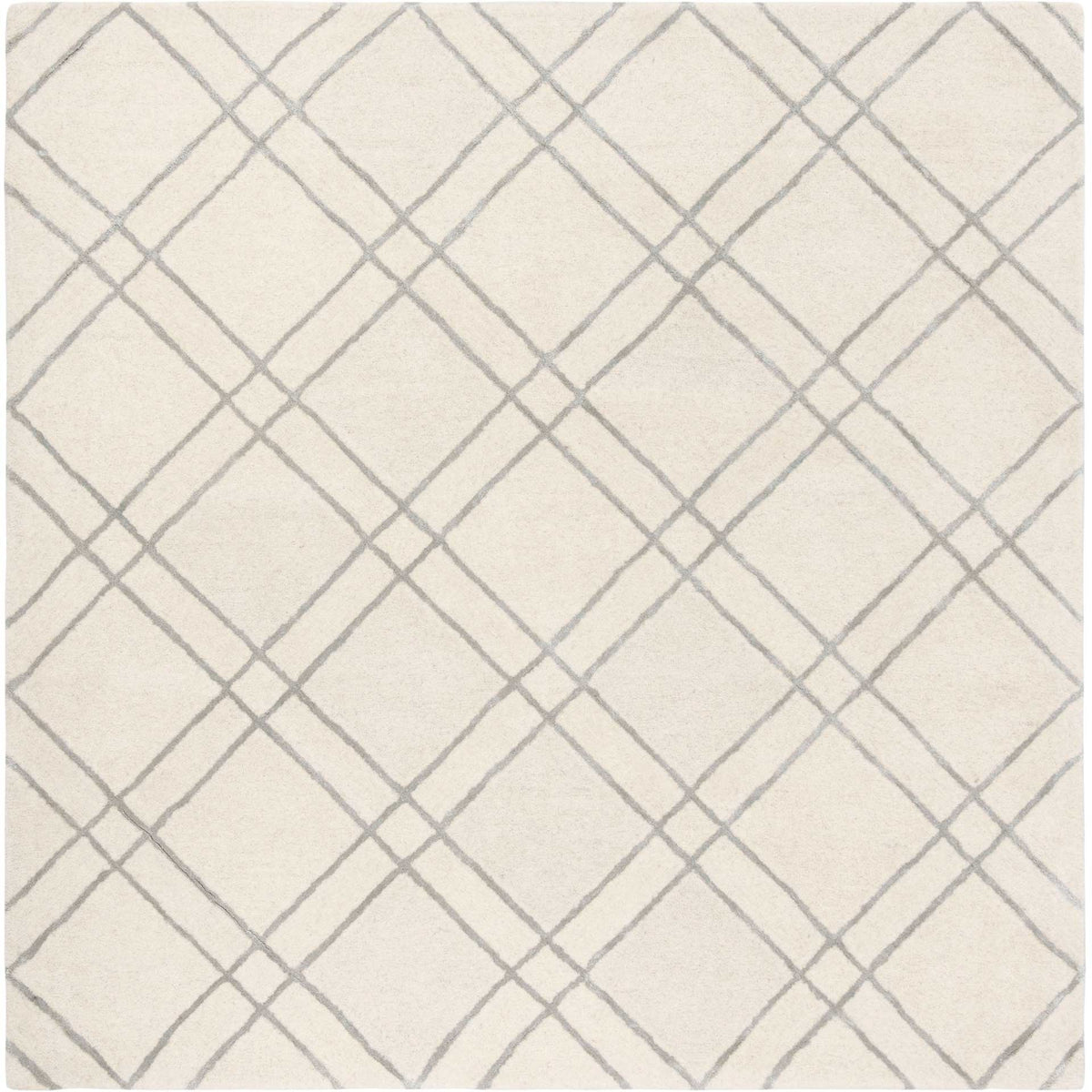 Square ivory wool rug with soft silver geometric latticework
