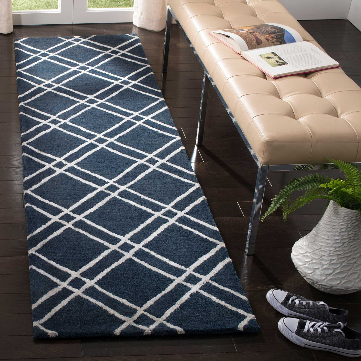 Rich navy runner with bright silver crisscross lines and a plush wool pile