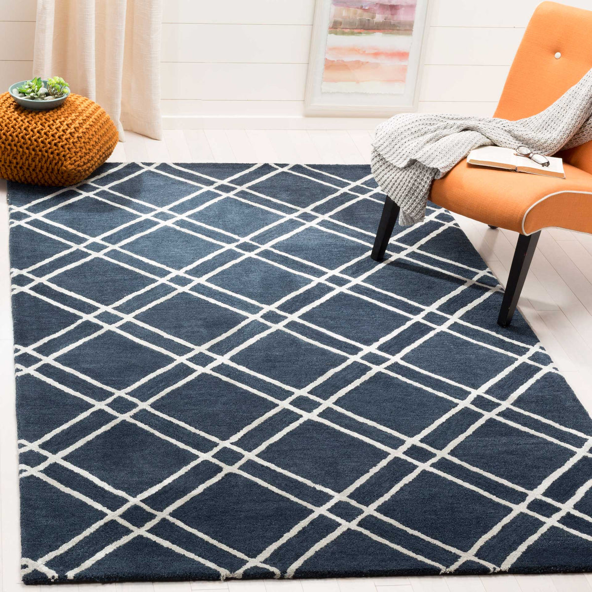 Navy and silver diamond lattice gives a seating area bold, tailored contrast
