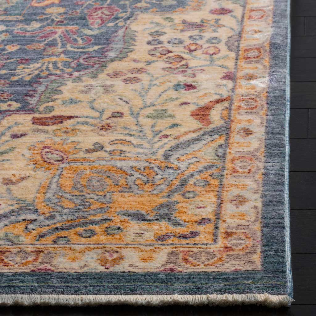 A low-pile corner shows golden scrollwork and delicate florals beside a narrow blue edge.