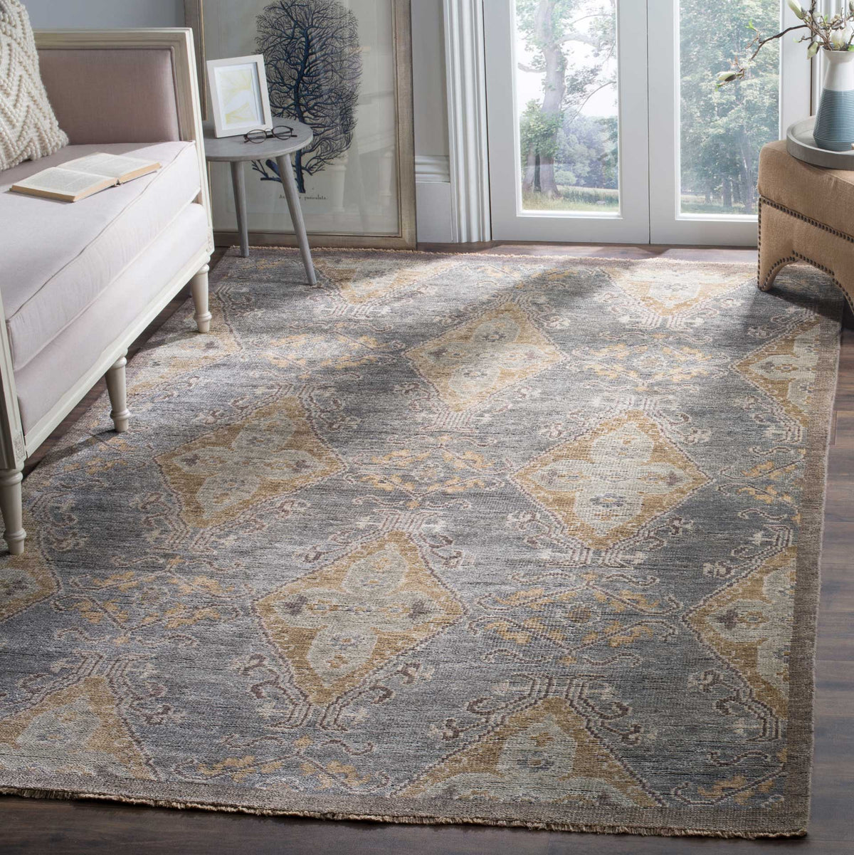 Charcoal and taupe diamond motifs bring timeless pattern to a bright living room