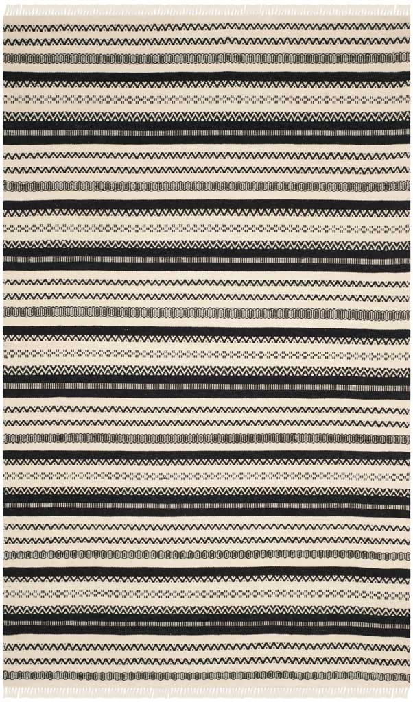 A 5 x 8 ft handwoven rug alternates ivory and black patterned bands with fringed ends
