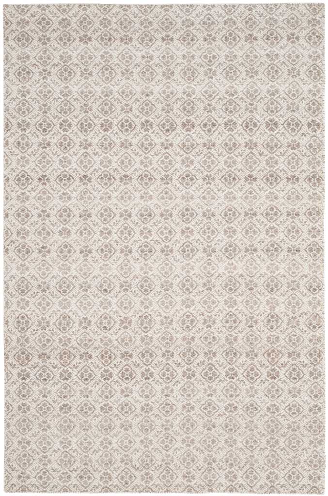 A compact wool-cotton rug layers ornate gray motifs over a warm ivory field