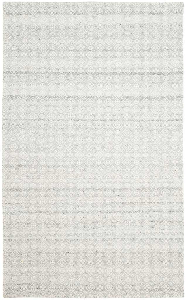 Silver floral medallions form a subtle allover pattern against this ivory wool rug