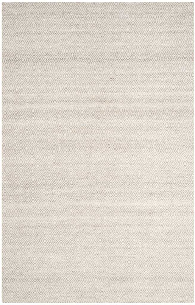 Silver diamond motifs weave softly through the ivory wool rug's subtly shaded surface
