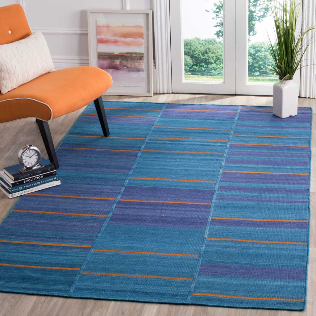 Blue and purple wool stripes with orange accents bring vibrant warmth to a living space
