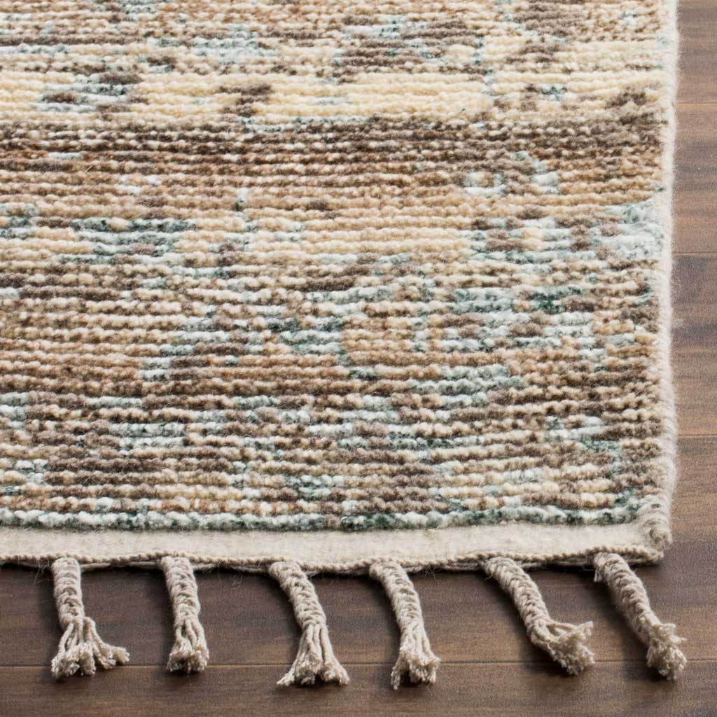 Variegated woven texture meets a finished edge and long, twisted fringe