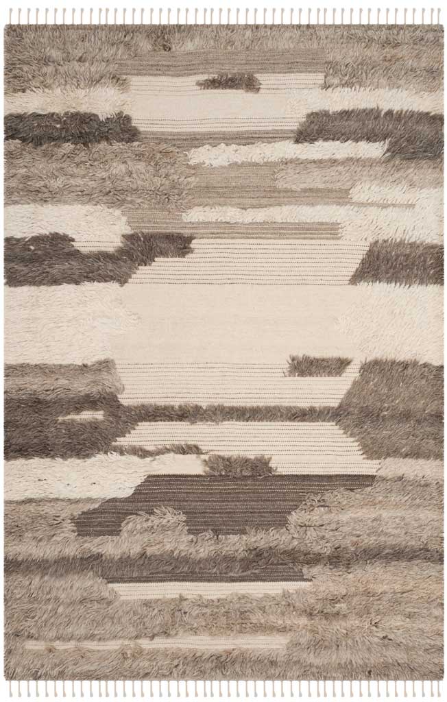 Ivory and gray rug with layered, shaggy stripes and fringed edges