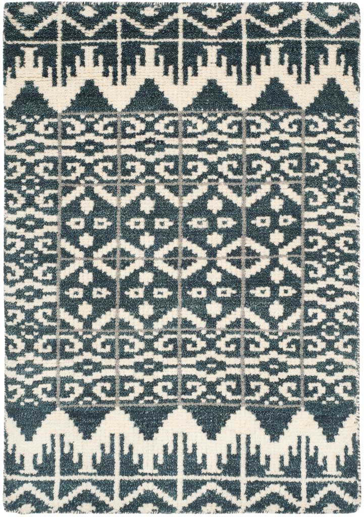 A compact charcoal and ivory accent rug pairs central geometric medallions with sharp triangular bands