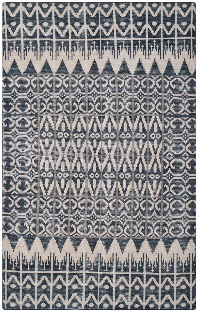 A hand-knotted charcoal and ivory rug features stacked diamond motifs and intricate patterned borders