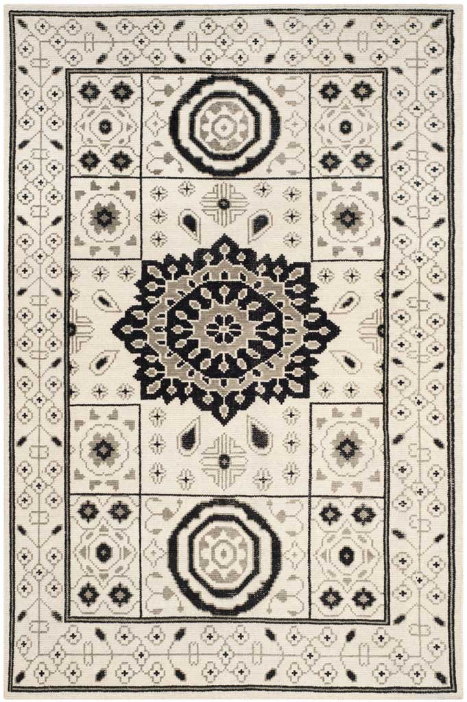 Ivory and gray hand-knotted rug with a bold central medallion and repeating floral accents