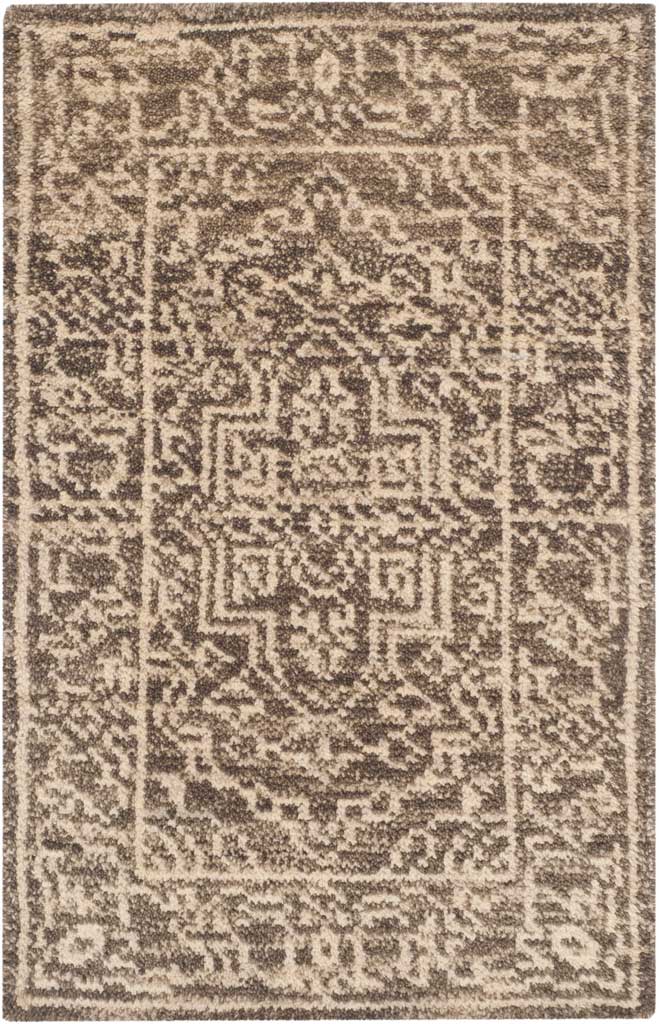 Small brown and beige rug with a softly distressed medallion and ornate floral frame