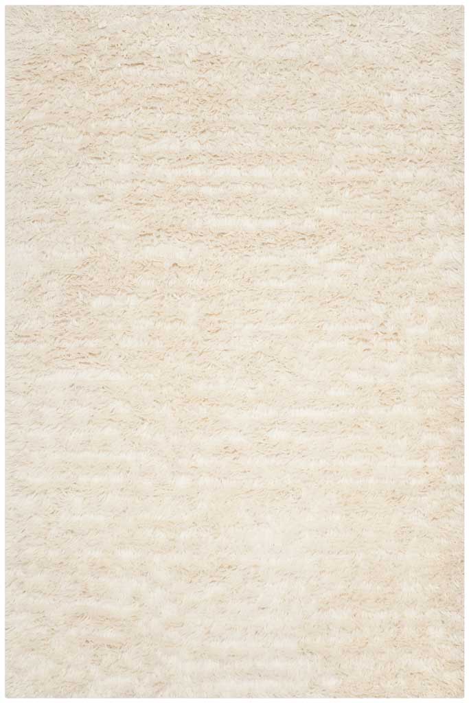 A creamy ivory pile gives this rectangular rug a cozy, gently varied texture