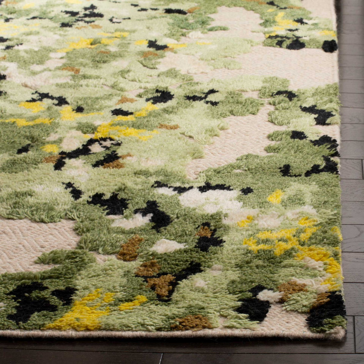Raised green and yellow tufts add lush texture to the beige rug's floral pattern