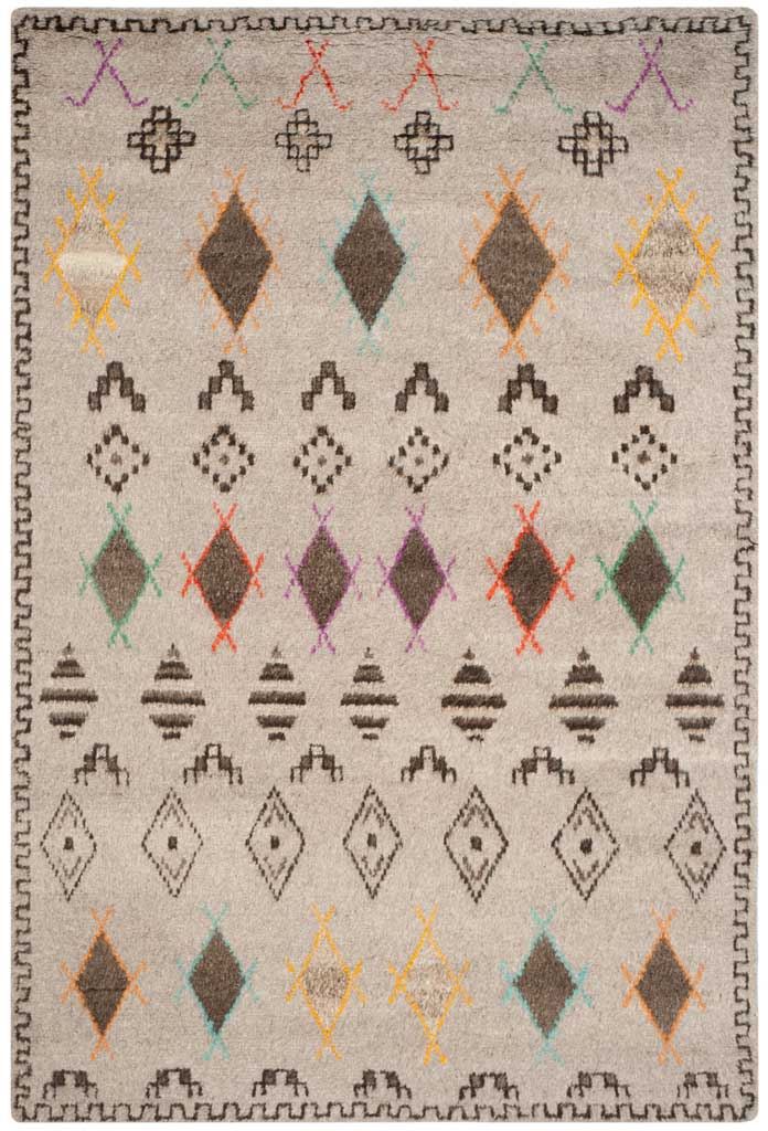 Plush natural rug mixes orange, green and purple diamonds with intricate dark motifs along the edges.