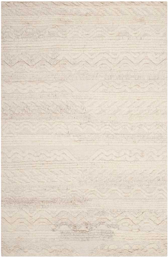 Hand-knotted ivory rug with delicate waves and tonal geometric details