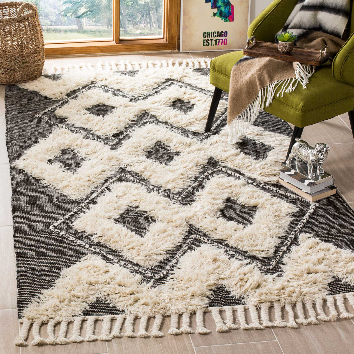 A plush black and ivory diamond rug brings bold pattern and soft texture to a cozy seating area