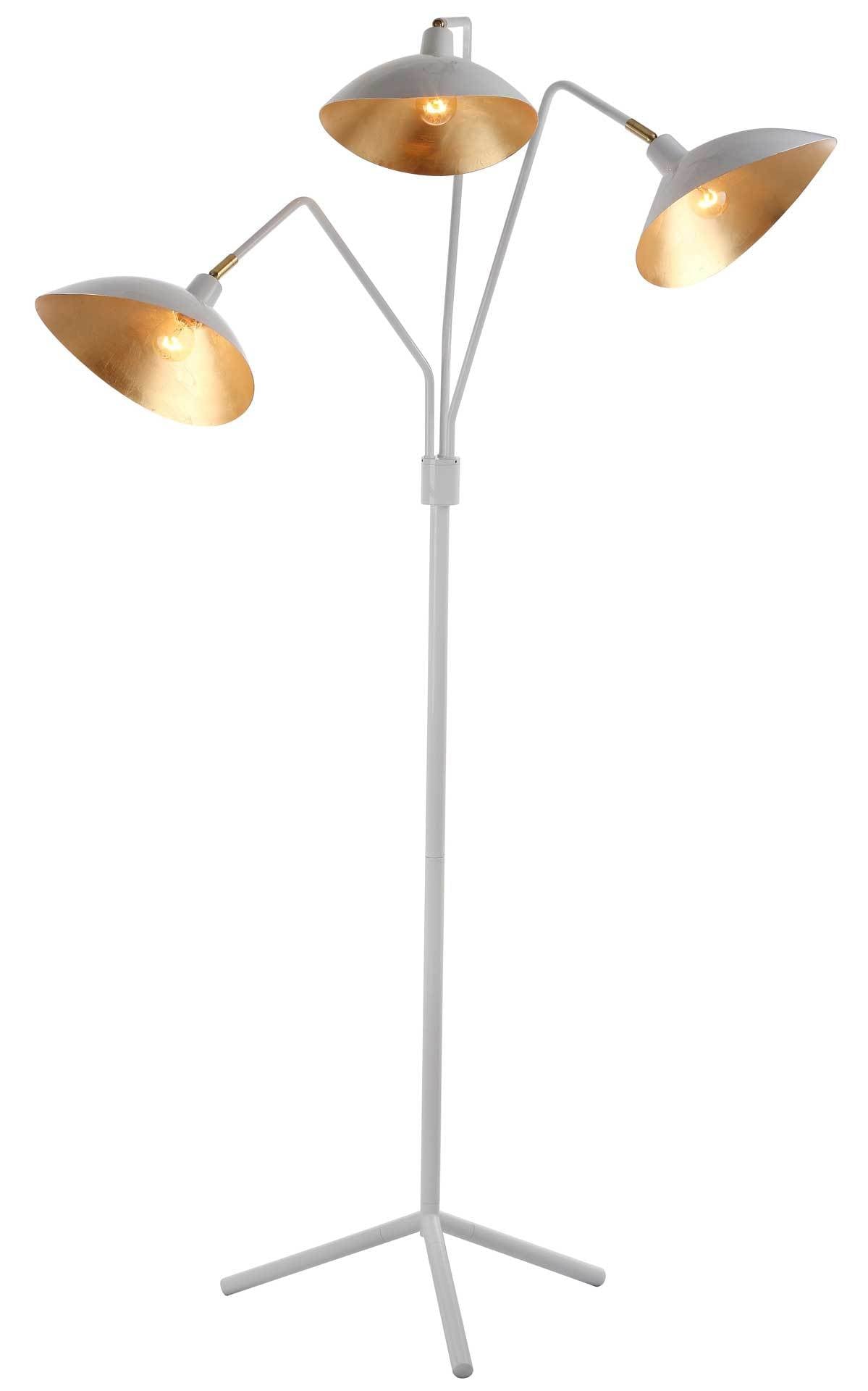 Three gold-lined shades cast a warm glow from this white floor lamp with branching arms