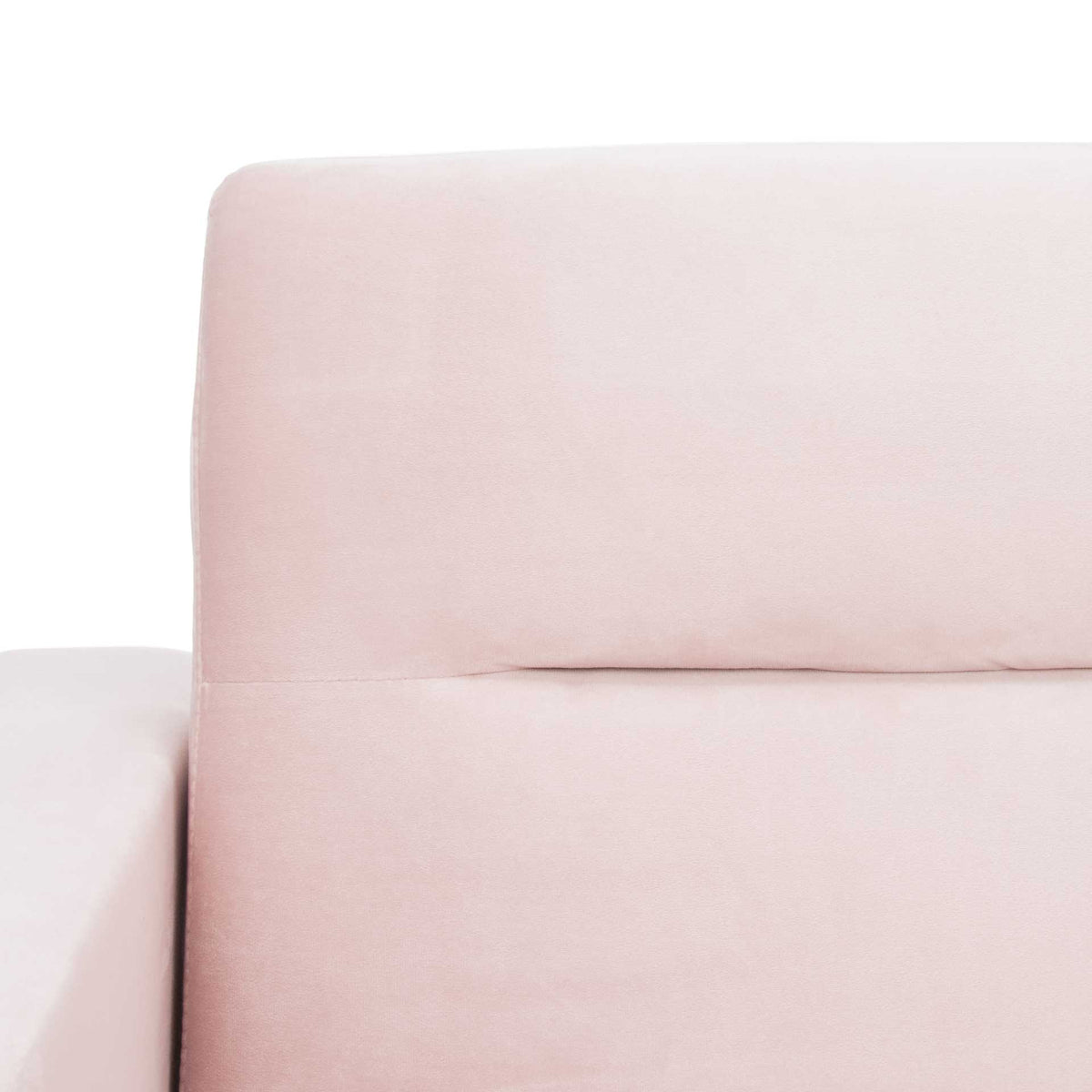A subtle horizontal seam accents the soft blush velvet on the cushioned backrest.