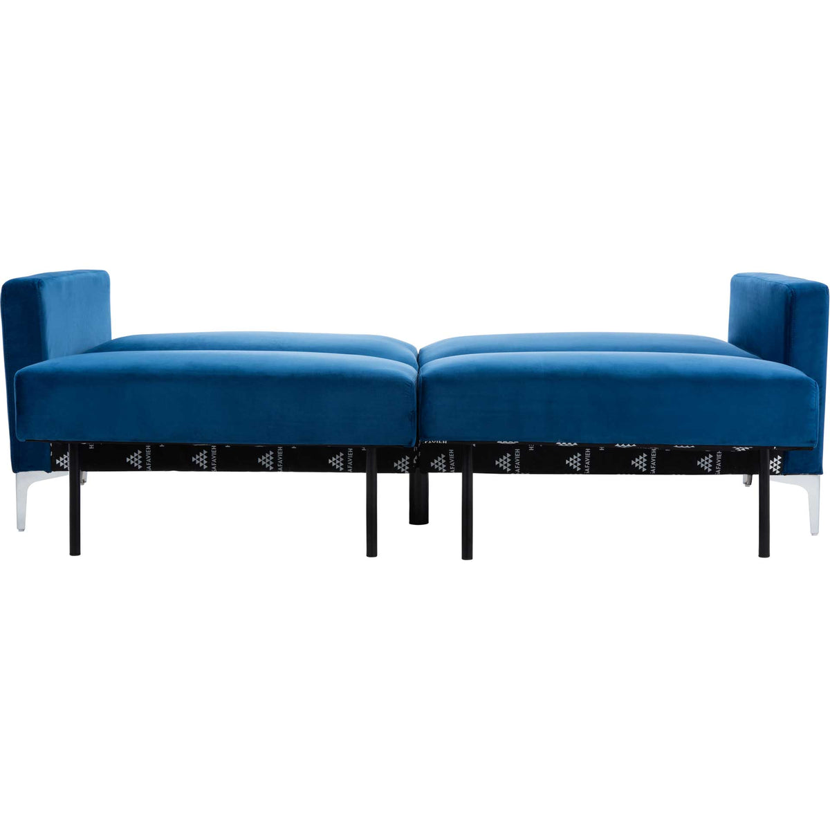 Navy velvet cushions lie flat to form a guest bed with slender support legs