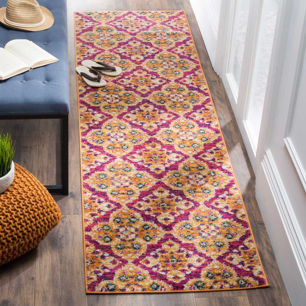 Ornate fuchsia and gold runner adds vivid color and floral detail to a hallway
