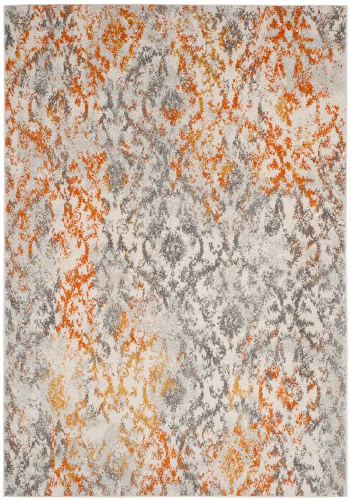 Cream area rug with faded gray medallions and lively orange accents