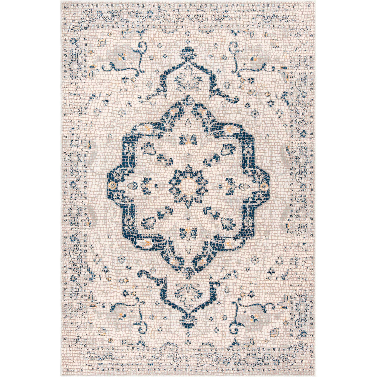 An ivory rug features a navy quatrefoil medallion, scrolling vines, and a patterned border