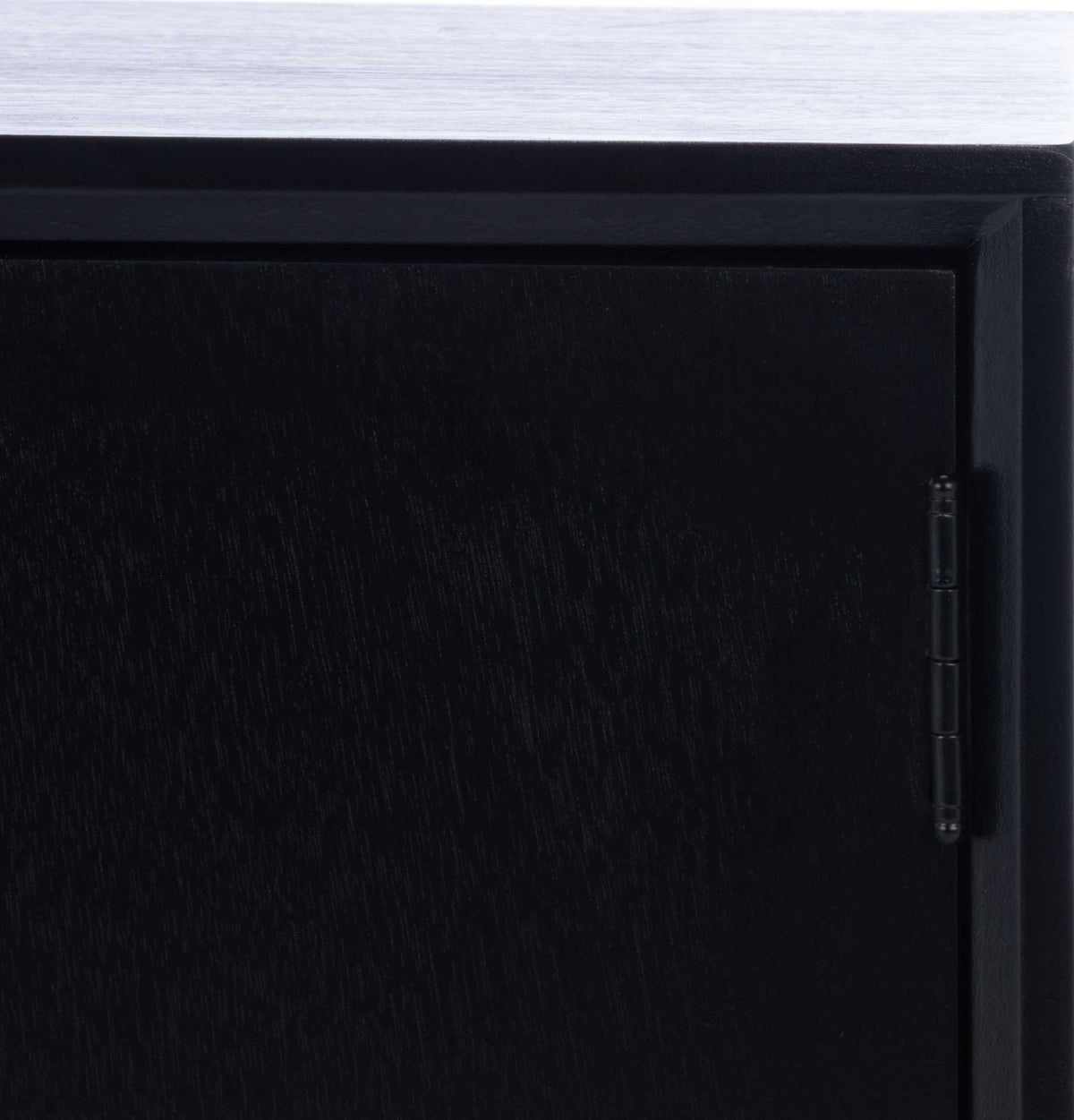 A discreet hinge and inset door emphasize the black cabinet's clean lines.