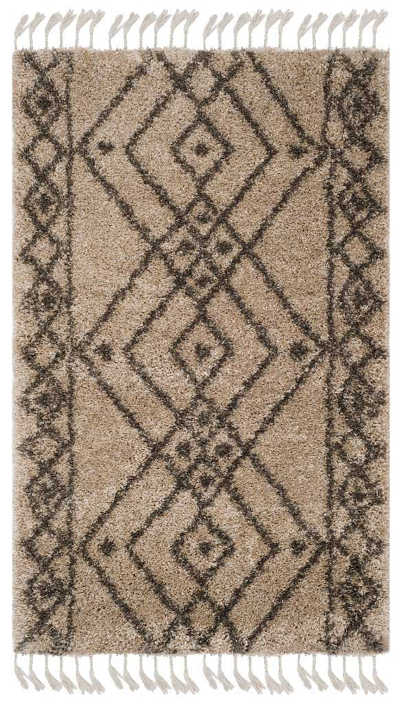 Mushroom-colored shag displays charcoal-gray diamonds, slim borders, and pale tassels