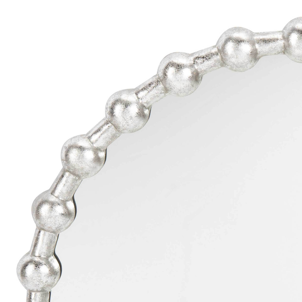 Textured silver beads linked by slender bars bring character to the mirror's rim.