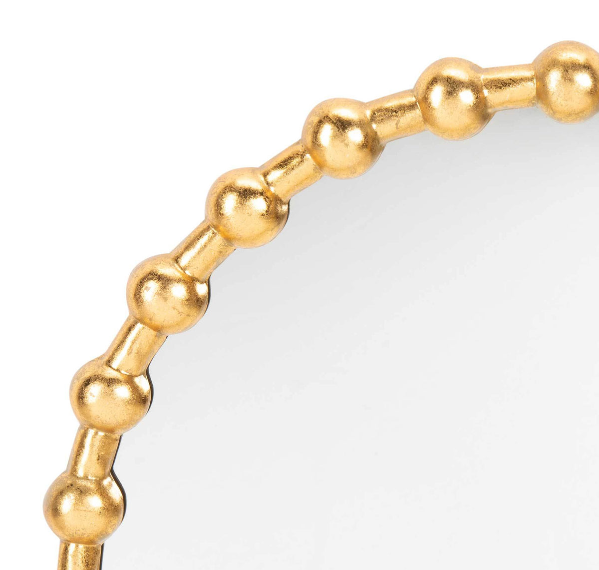 Gold beads joined by slender bars create a lustrous border around the mirror.