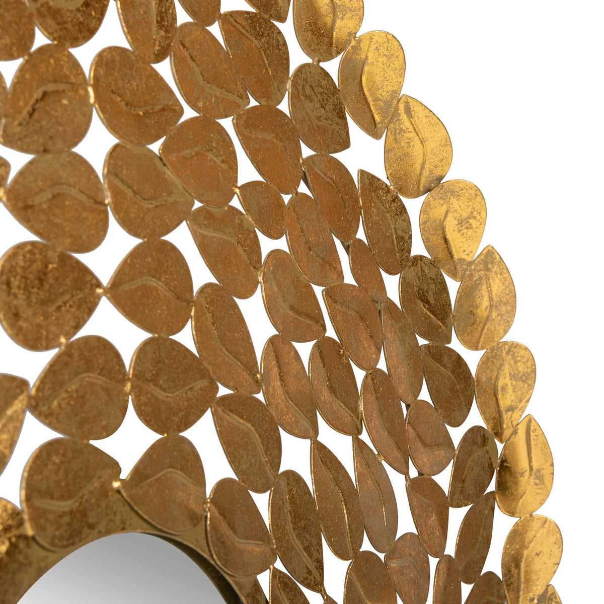 Layered gold metal leaves reveal delicate veining and an openwork design